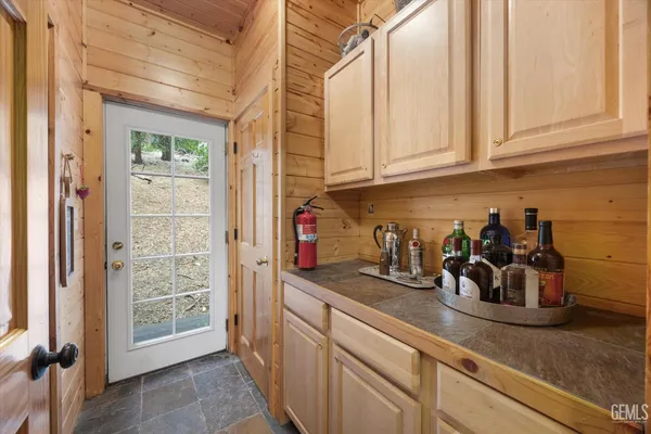 a view of a hallway with front door