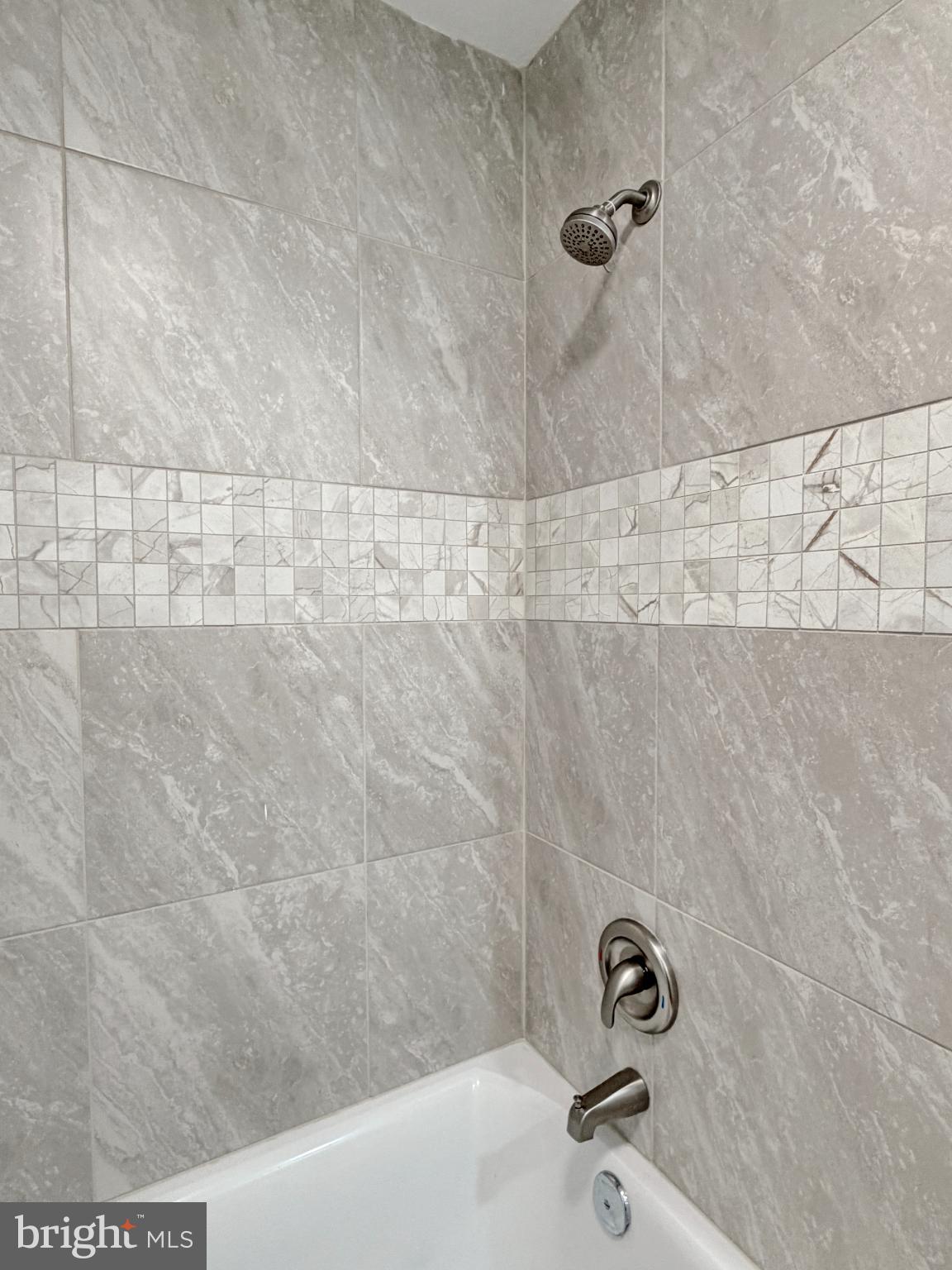 9350 Mathir Drive La Plata, MD 20646 - Photo 11 of 44 Elegant shower with modern tile design.