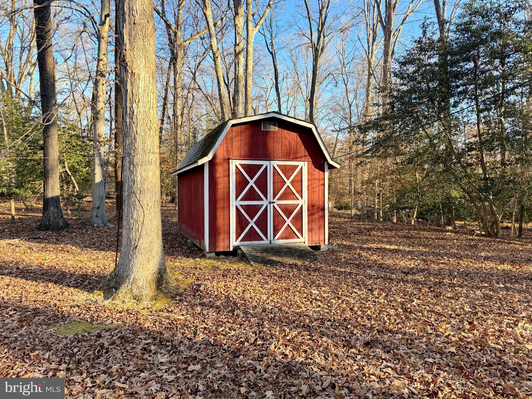9350 Mathir Drive La Plata, MD 20646 - Photo 43 of 44 a backyard of a house with lots of green space