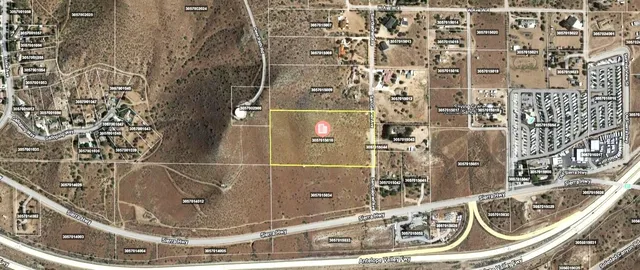 an aerial view of a highlighted house