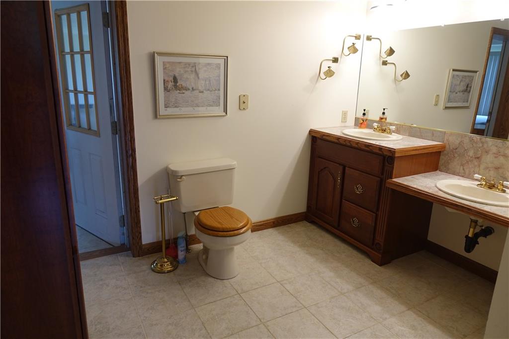 917 New Castle Road Butler, PA 16001 - Photo 11 of 25 Master Bathroom with ceramic tile and double sinks