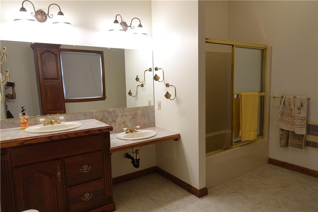 917 New Castle Road Butler, PA 16001 - Photo 12 of 25 Master Bathroom with ceramic tile and double sinks