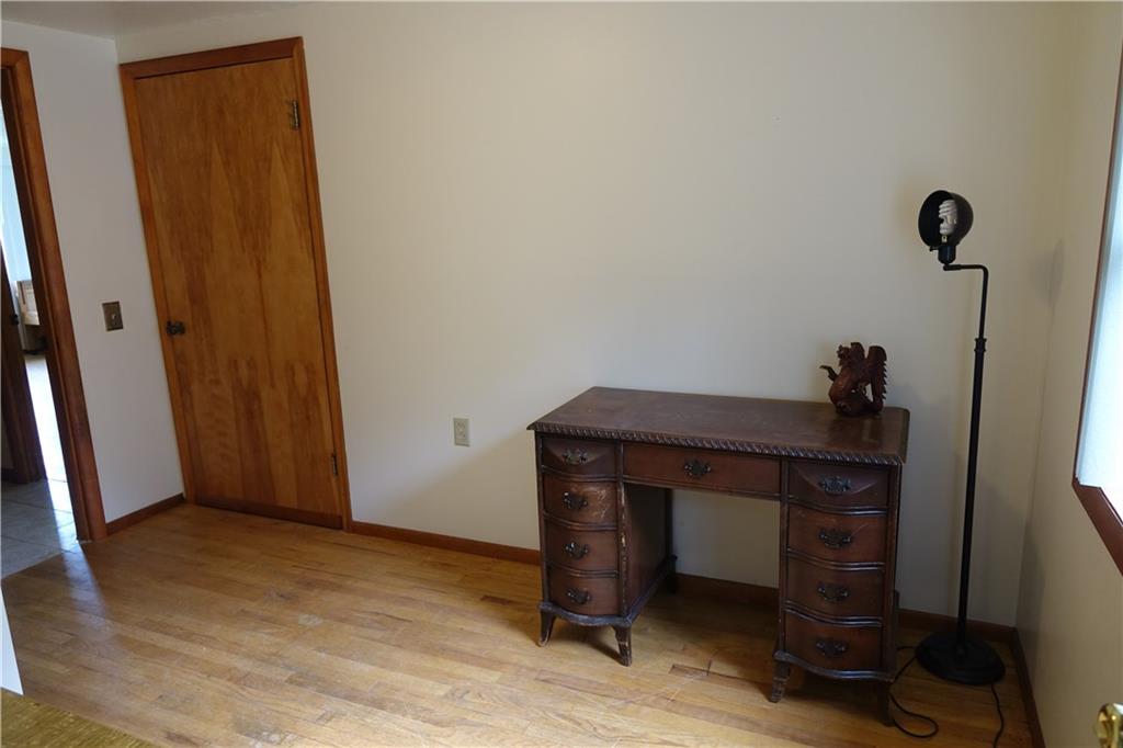 917 New Castle Road Butler, PA 16001 - Photo 15 of 25 Bedroom with hardwood flooring