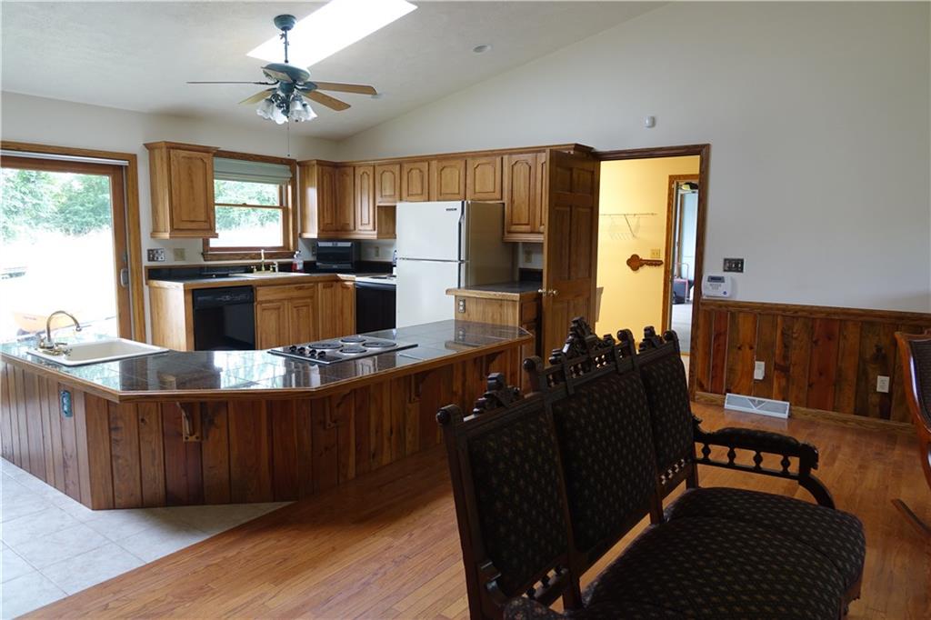 917 New Castle Road Butler, PA 16001 - Photo 4 of 25 Kitchen with ceramic flooring and abundant cabinetry and counter top space