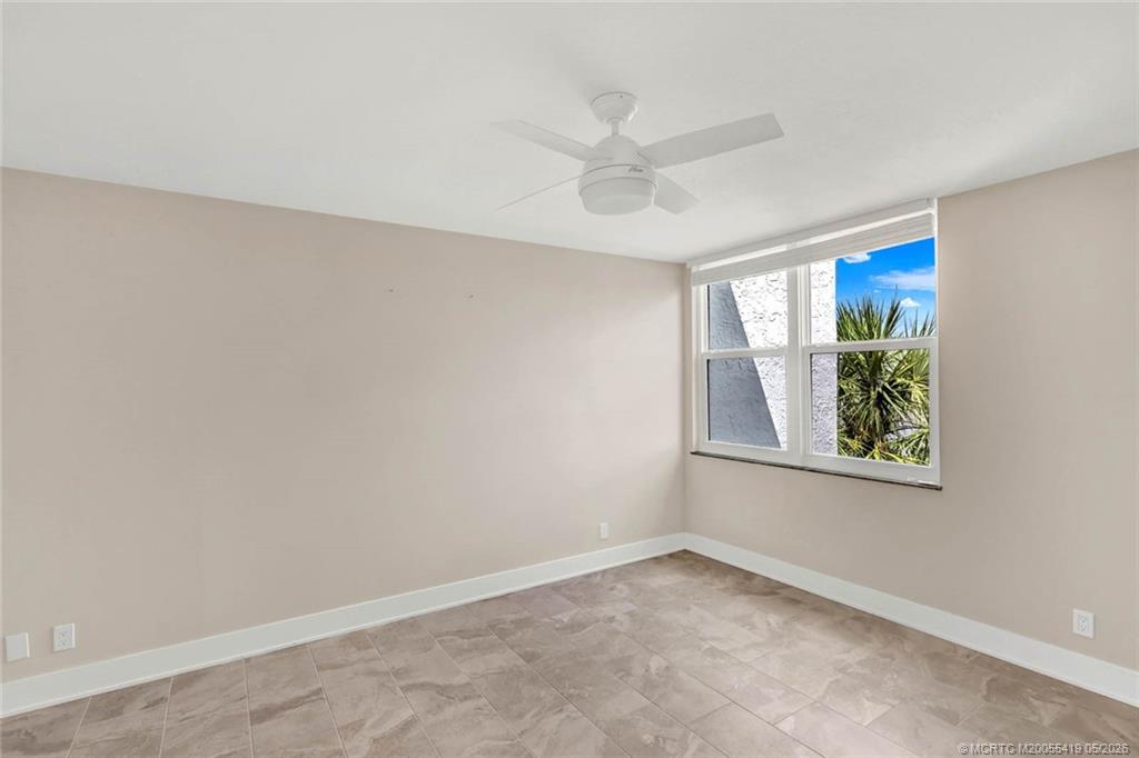 1950 Southwest Palm City Road, Unit 14305 Stuart, FL 34994 - Photo 31 of 70 an empty room with a window