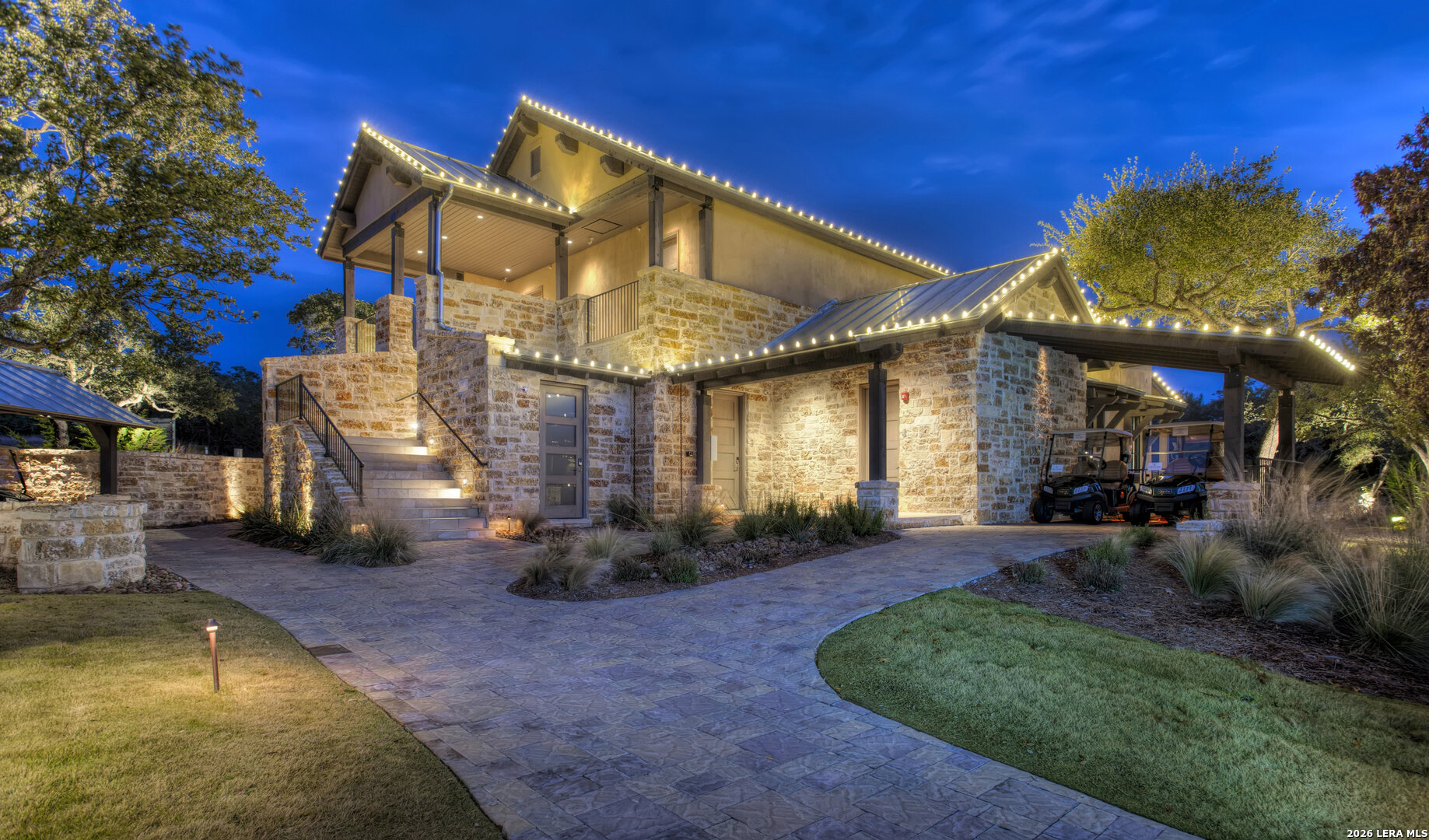 12 Ledgestone Place Boerne, TX 78006 - Photo 12 of 18 a view of a house with a swimming pool and sitting area