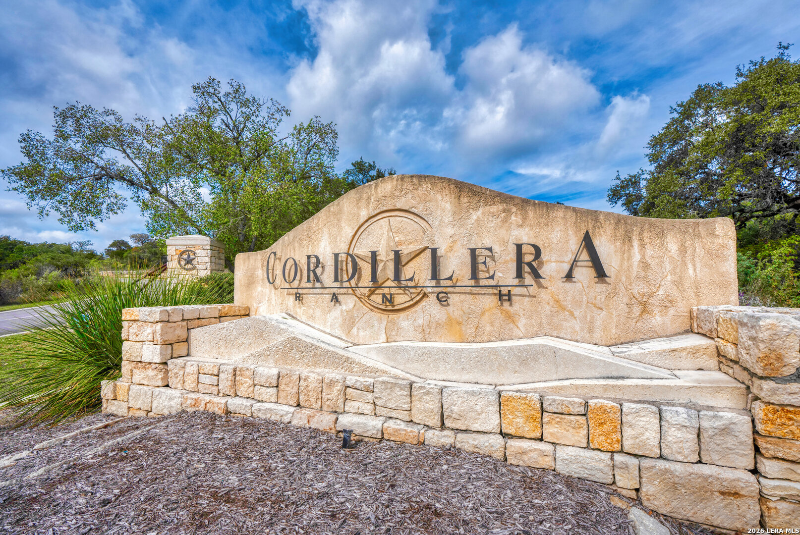 12 Ledgestone Place Boerne, TX 78006 - Photo 5 of 18 a view of a park with iron fence