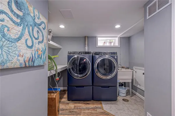 a utility room with dryer and washer