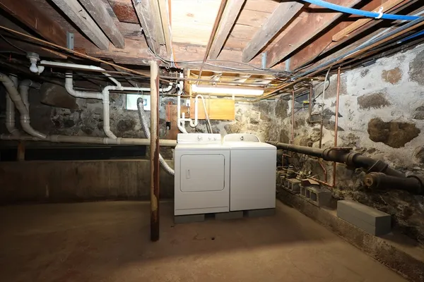 a utility room with dryer and washer