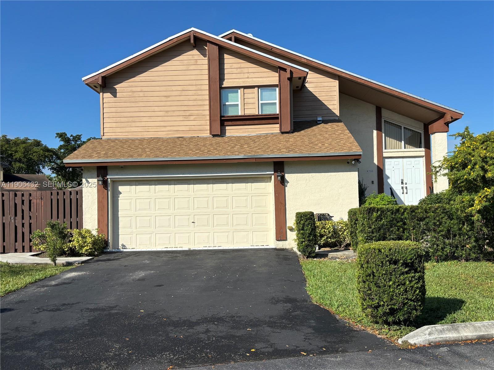 4314 Southwest 148th Court Miami, FL 33185 - Photo 1 of 32 a view of an house with backyard and garden