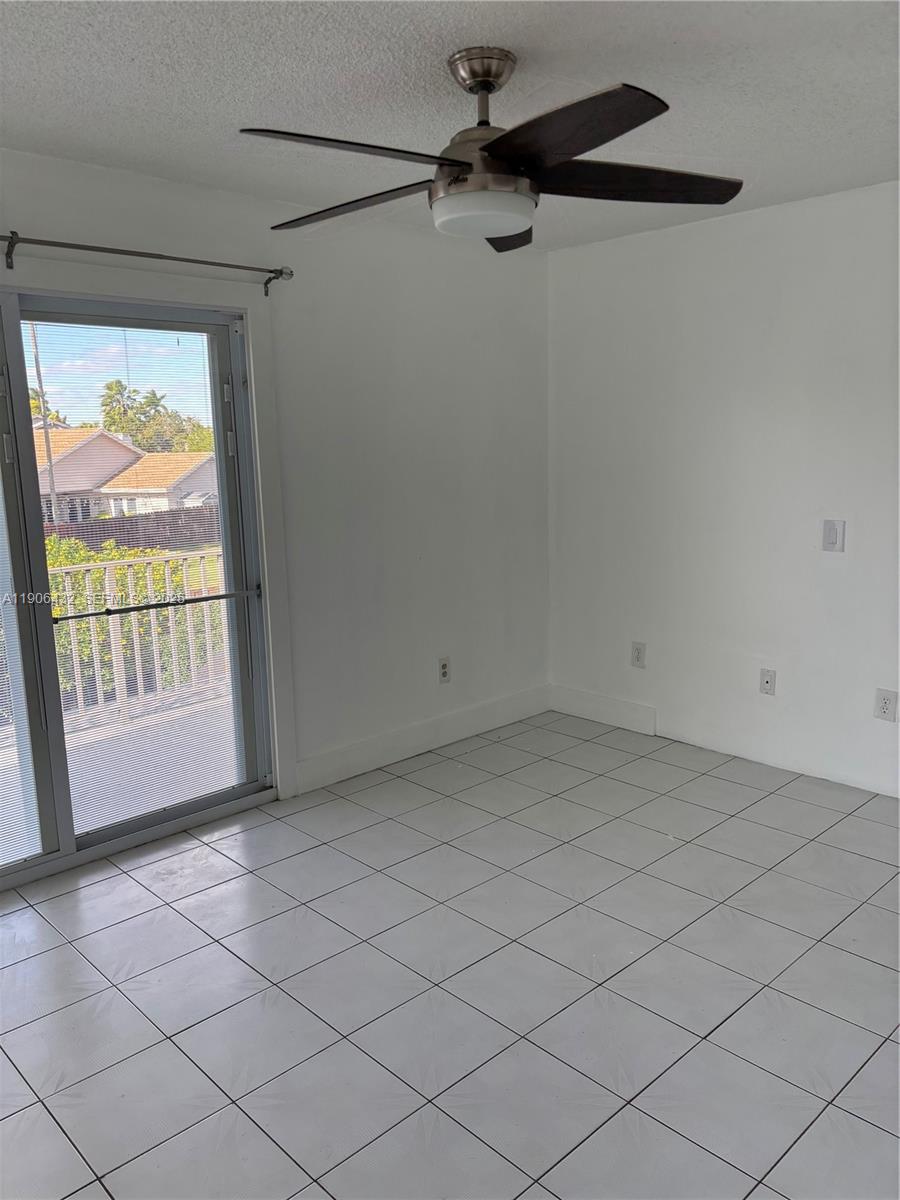 4314 Southwest 148th Court Miami, FL 33185 - Photo 22 of 32 a view of an empty room and a window