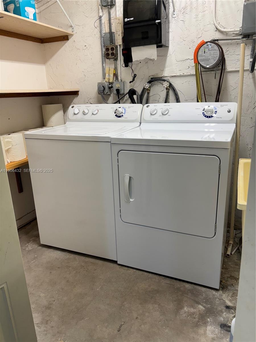 4314 Southwest 148th Court Miami, FL 33185 - Photo 32 of 32 a utility room with dryer and washer
