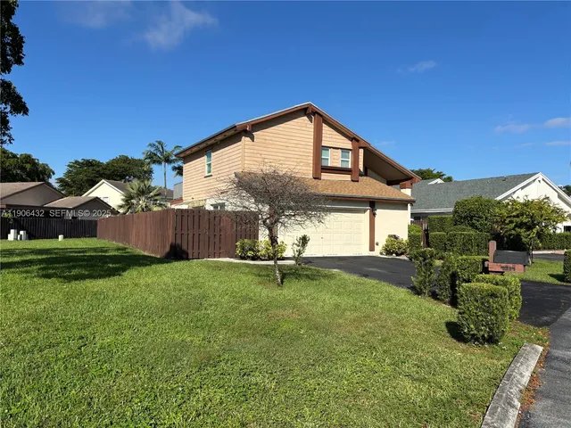 a sign on the side of the road