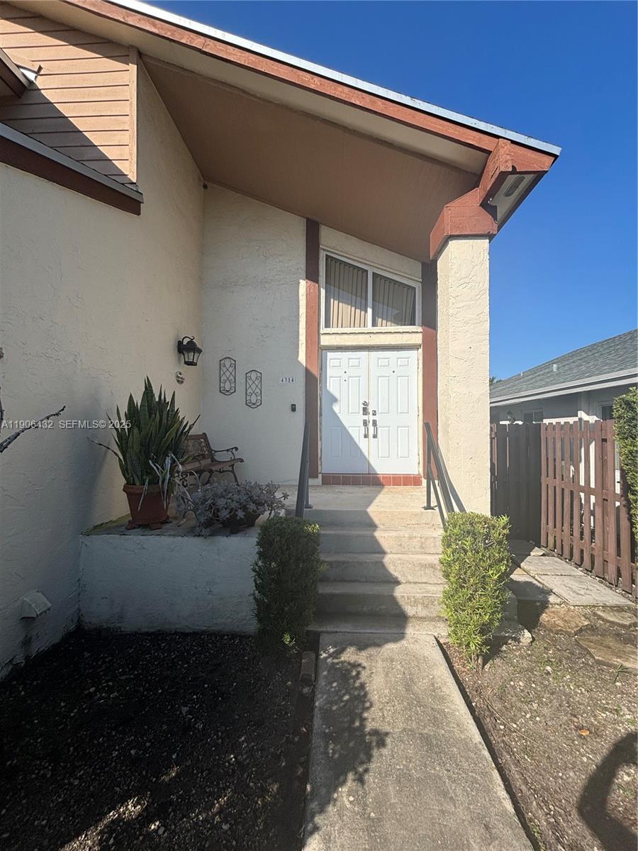4314 Southwest 148th Court Miami, FL 33185 - Photo 6 of 32 a front view of a house