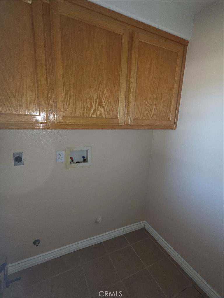 10141 Rochester Road Phelan, CA 92371 - Photo 18 of 22 an empty room with wooden floor