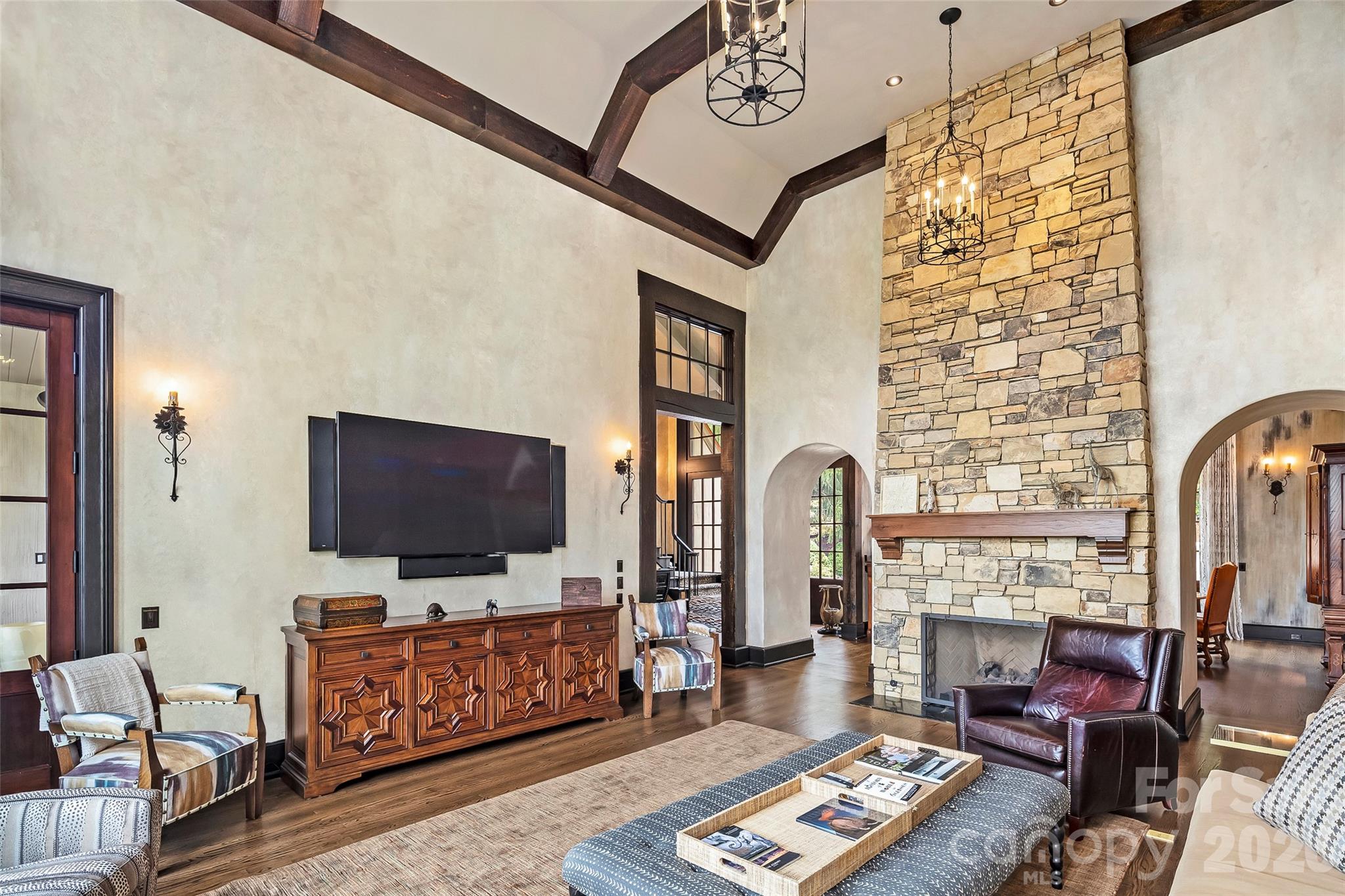 1929 Tree View Trail Arden, NC 28704 - Photo 11 of 48 a living room with furniture and a flat screen tv