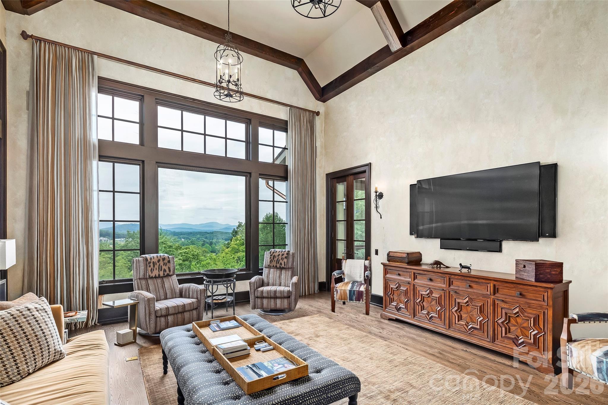 1929 Tree View Trail Arden, NC 28704 - Photo 12 of 48 a living room with furniture and a flat screen tv