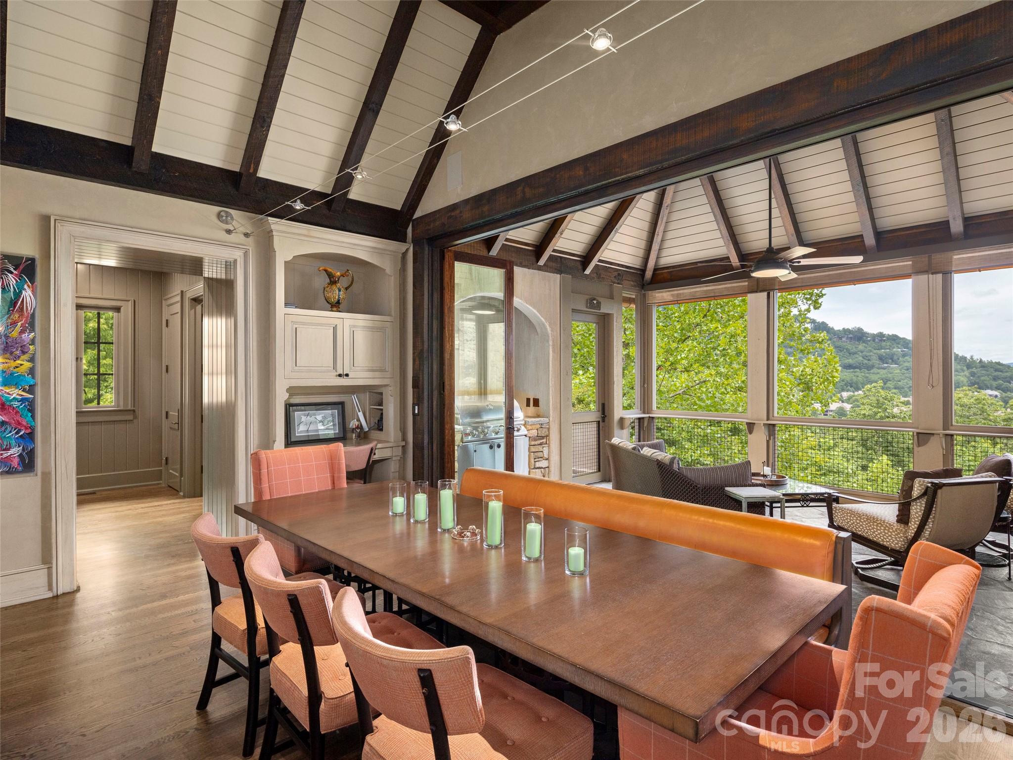 1929 Tree View Trail Arden, NC 28704 - Photo 19 of 48 a view of a dining room with furniture window and wooden floor