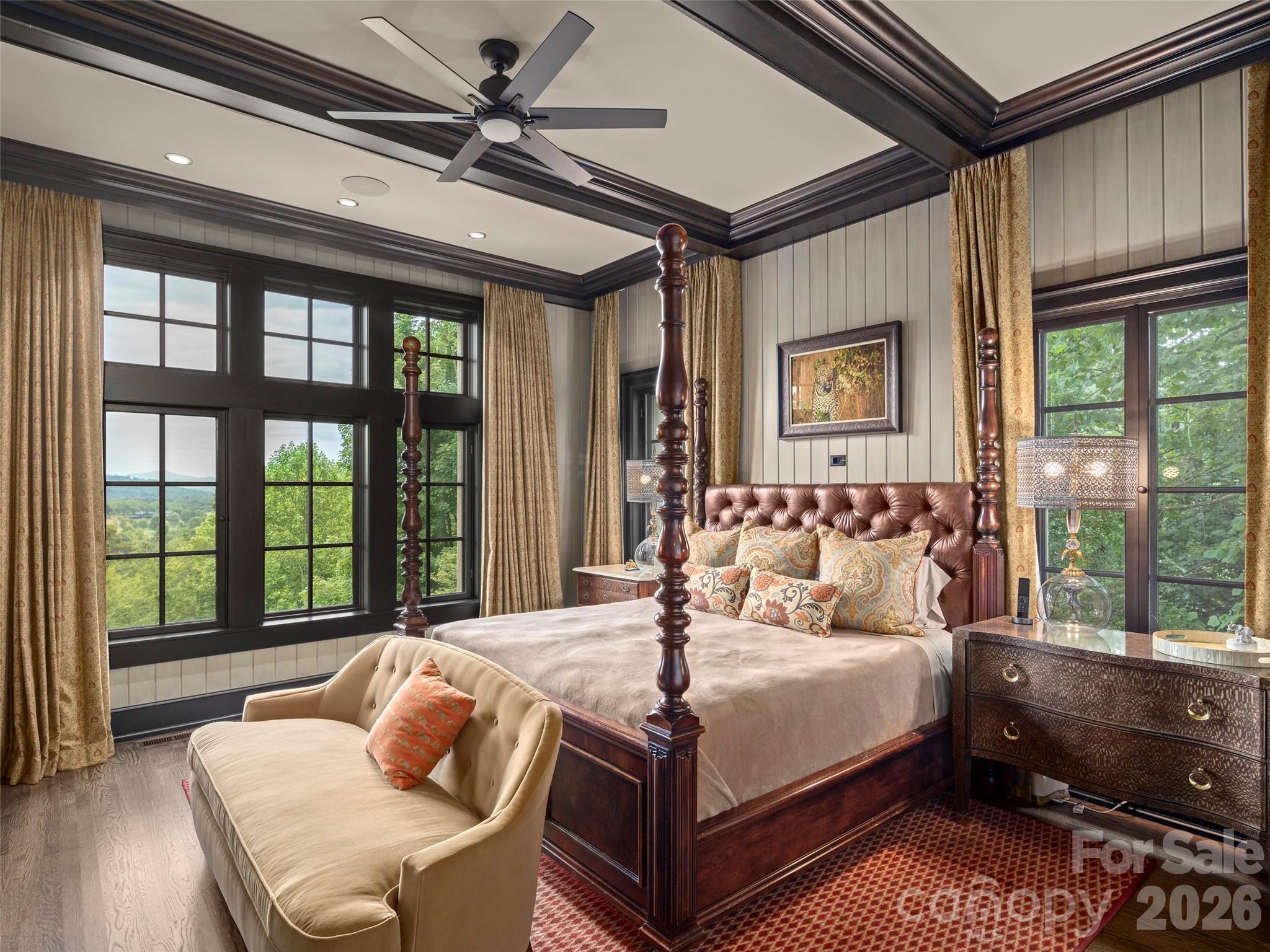 1929 Tree View Trail Arden, NC 28704 - Photo 25 of 48 a bed sitting in a bedroom next to a large window