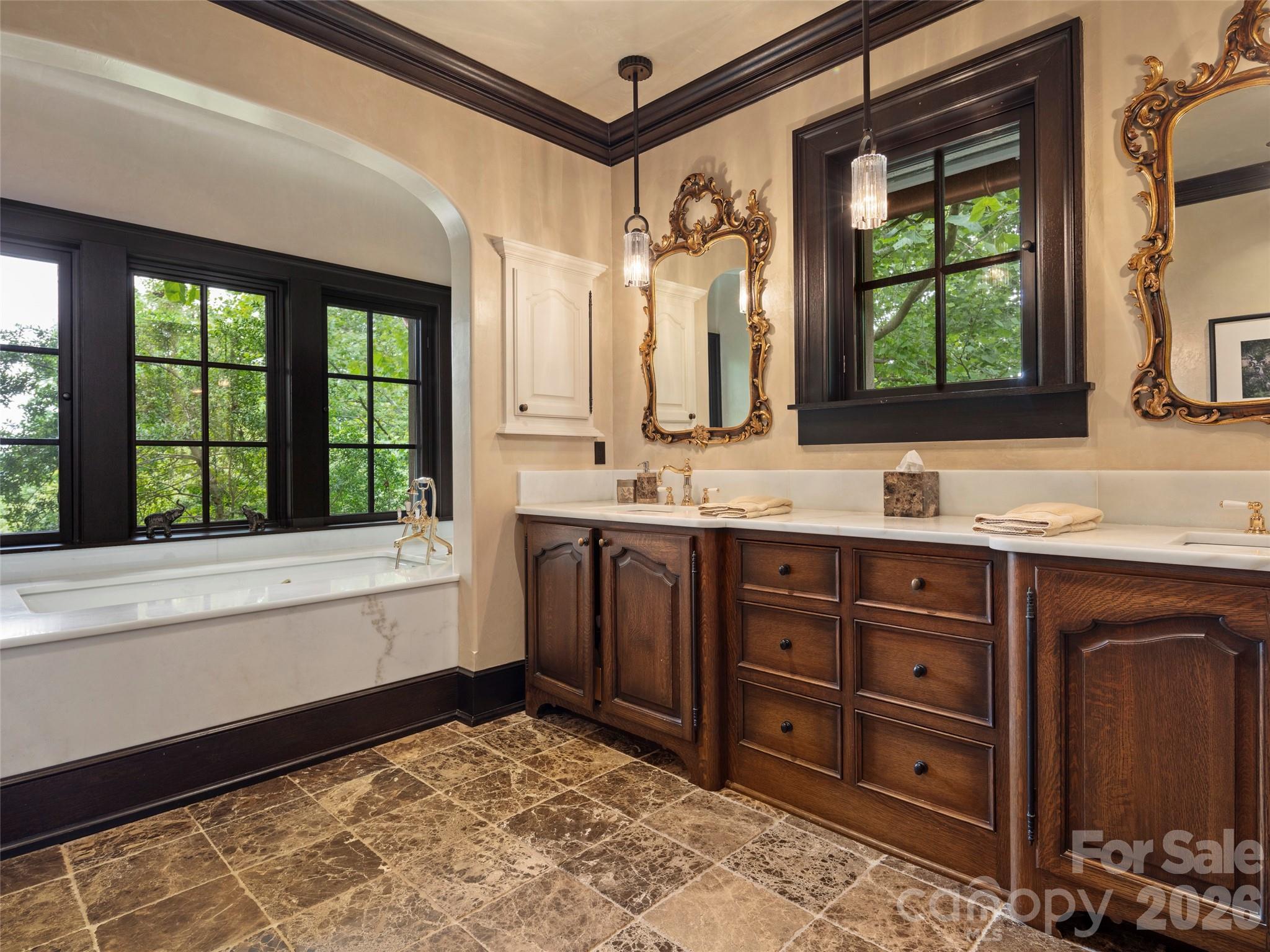 1929 Tree View Trail Arden, NC 28704 - Photo 27 of 48 a bathroom with a tub sink and mirror