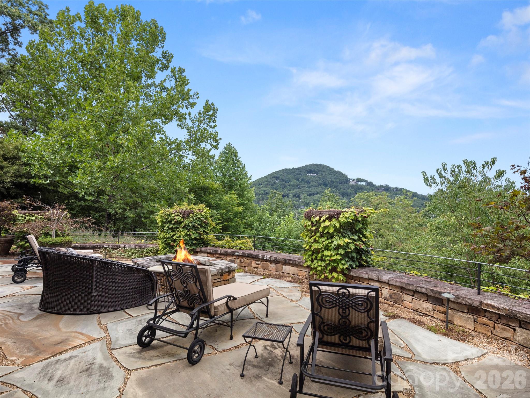 1929 Tree View Trail Arden, NC 28704 - Photo 36 of 48 a view of a chairs and table in the terrace