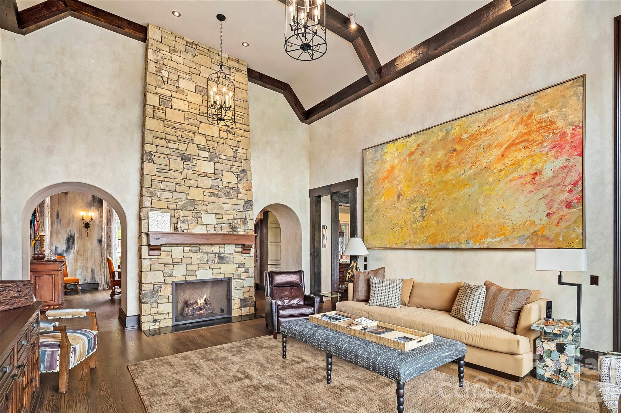1929 Tree View Trail Arden, NC 28704 - Photo 10 of 48 a living room with furniture a rug and a fireplace