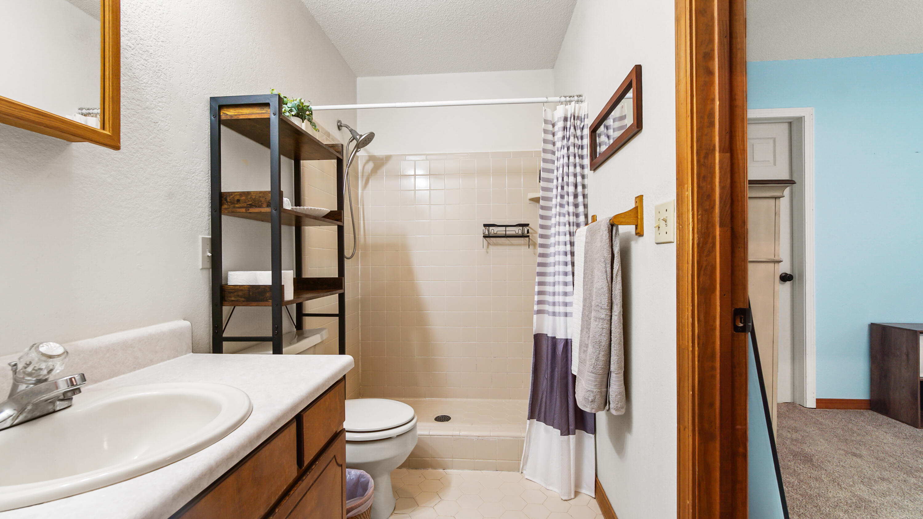 35 Marion Drive DeFuniak Springs, FL 32433 - Photo 14 of 38 a bathroom with a sink toilet and shower