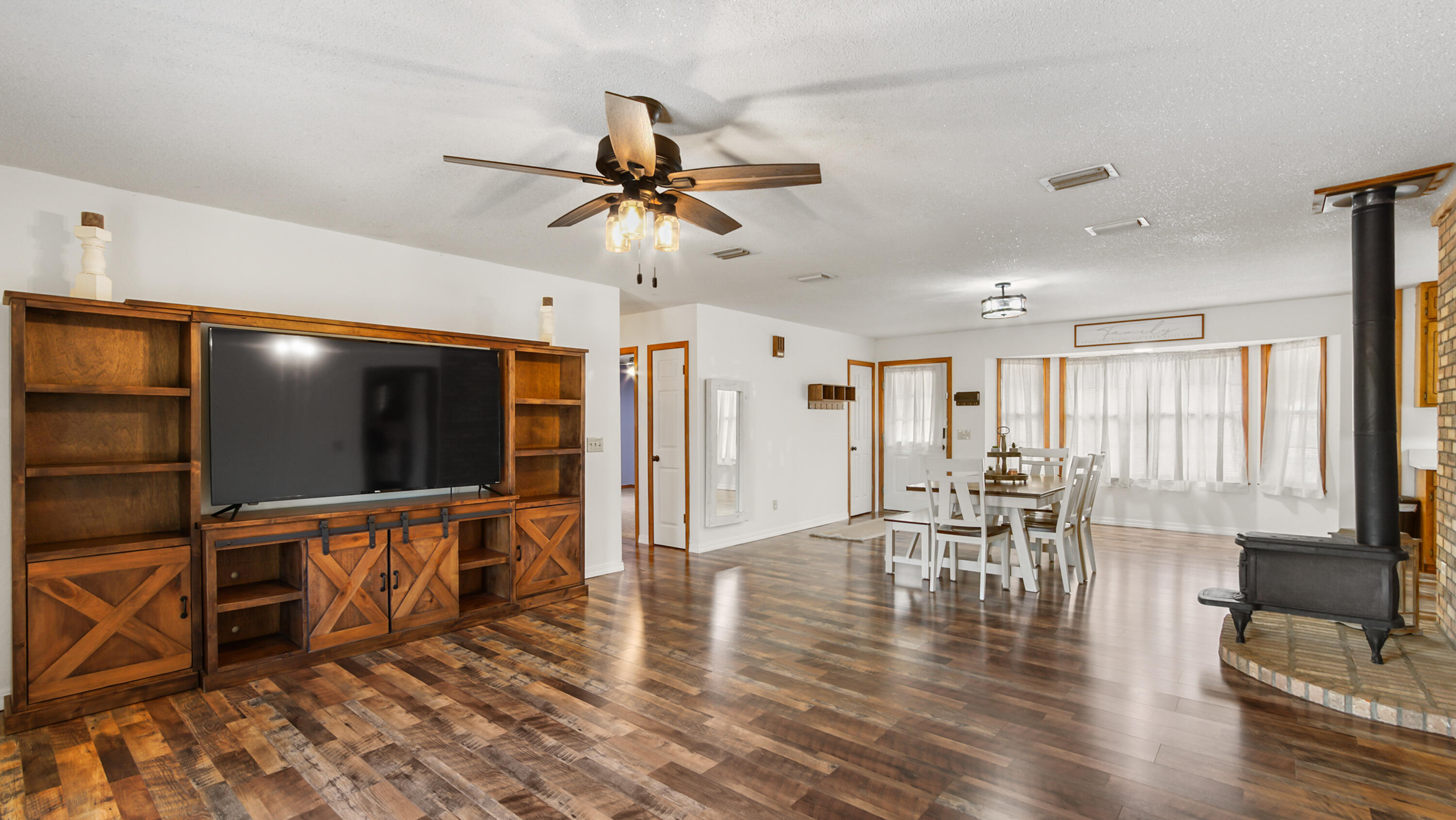 35 Marion Drive DeFuniak Springs, FL 32433 - Photo 3 of 38 a view of a livingroom with furniture and a flat screen tv
