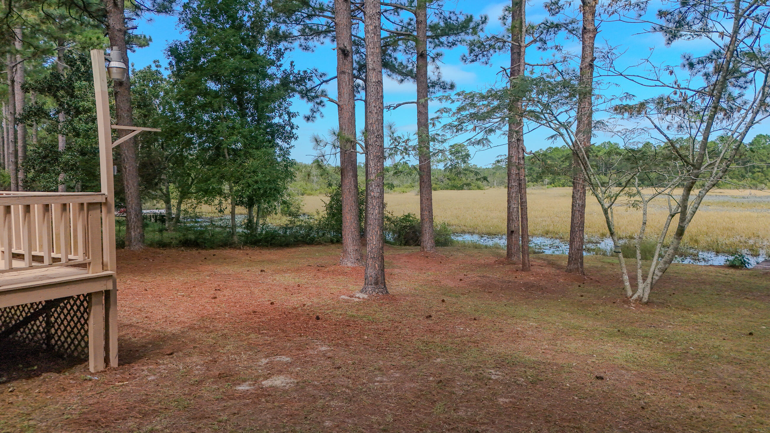 35 Marion Drive DeFuniak Springs, FL 32433 - Photo 31 of 38 a view of a house with a backyard