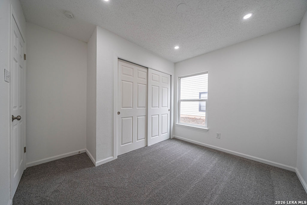 9131 Valley Ridge San Antonio, TX 78250 - Photo 8 of 12 a view of empty room