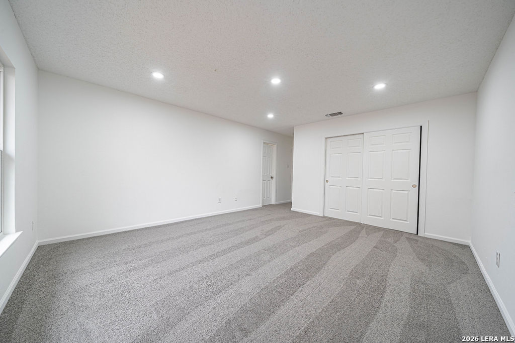 9131 Valley Ridge San Antonio, TX 78250 - Photo 9 of 12 a view of an empty room