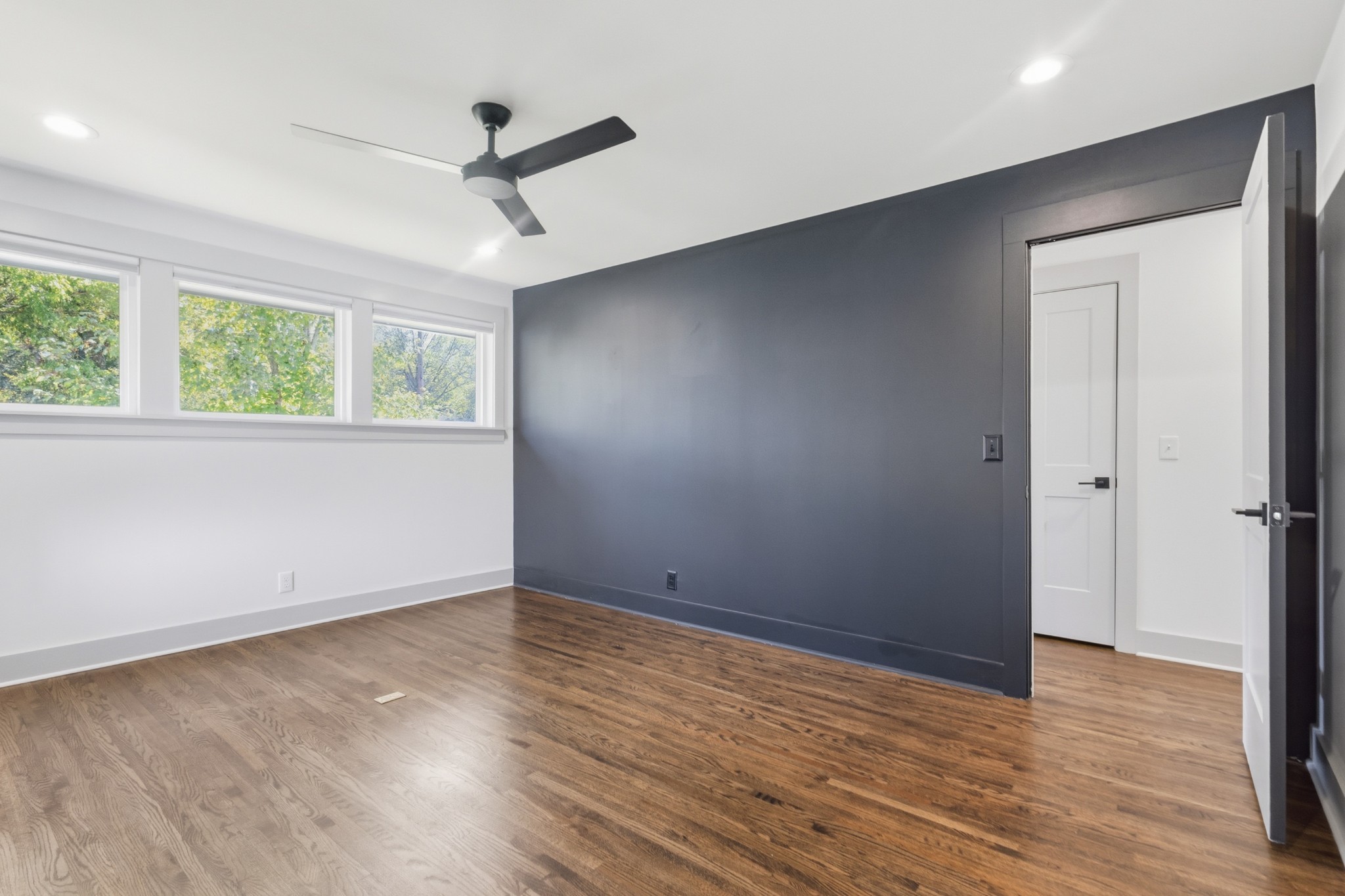 652 Moormans Arm Road Nashville, TN 37207 - Photo 13 of 25 wooden floor in an empty room with a window