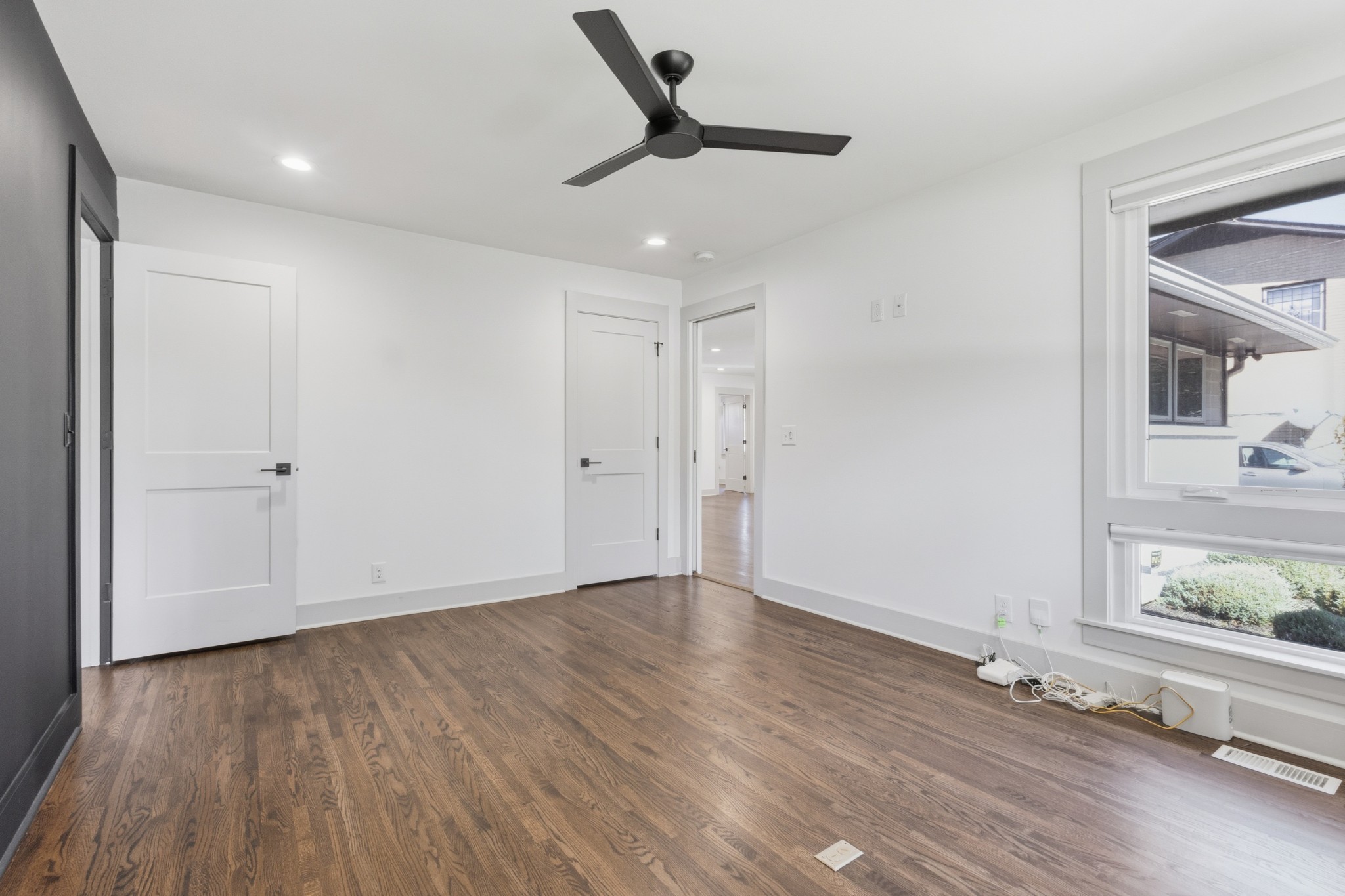 652 Moormans Arm Road Nashville, TN 37207 - Photo 14 of 25 wooden floor in an empty room with a window