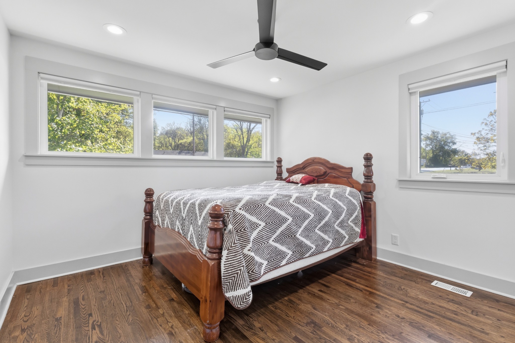 652 Moormans Arm Road Nashville, TN 37207 - Photo 15 of 25 a bed sitting in a bedroom next to a window