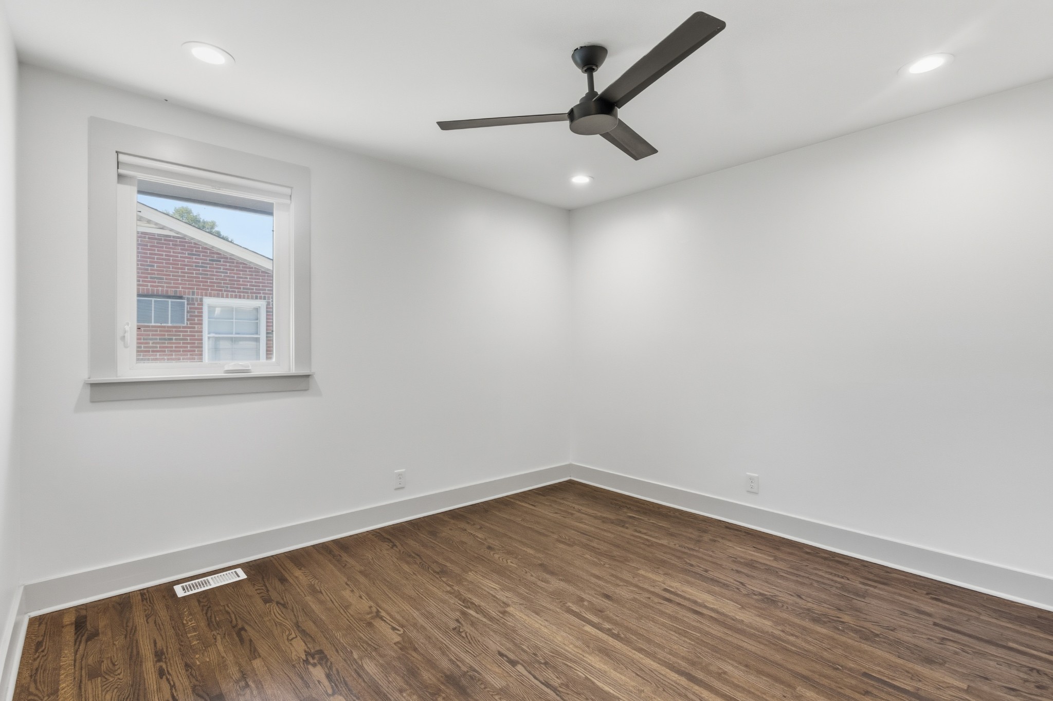 652 Moormans Arm Road Nashville, TN 37207 - Photo 17 of 25 wooden floor in an empty room with a window