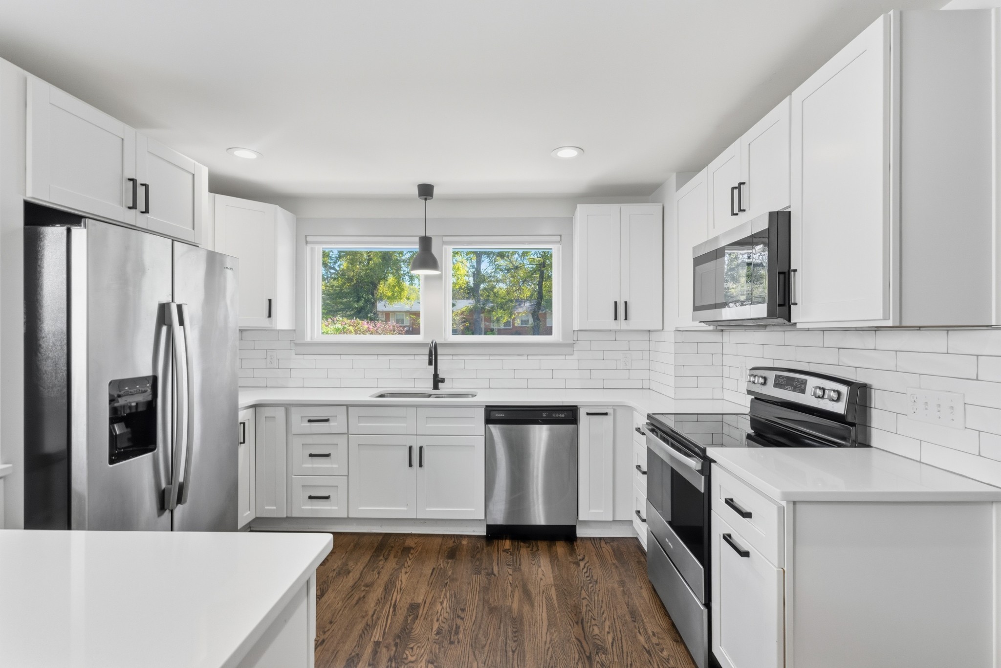 652 Moormans Arm Road Nashville, TN 37207 - Photo 7 of 25 a kitchen with stainless steel appliances a refrigerator sink and microwave
