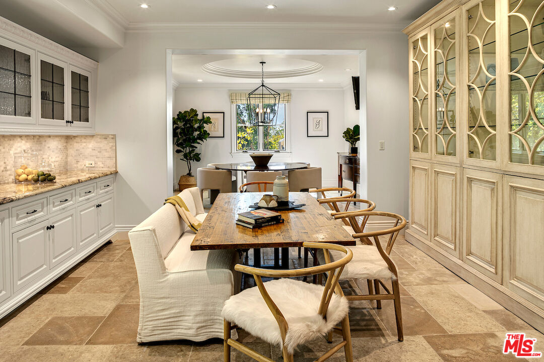 11025 Anzio Road Los Angeles, CA 90077 - Photo 18 of 34 a view of a dining room with furniture