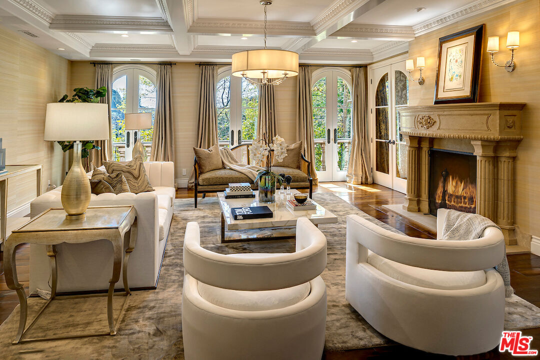 11025 Anzio Road Los Angeles, CA 90077 - Photo 9 of 34 a living room with furniture and a large window