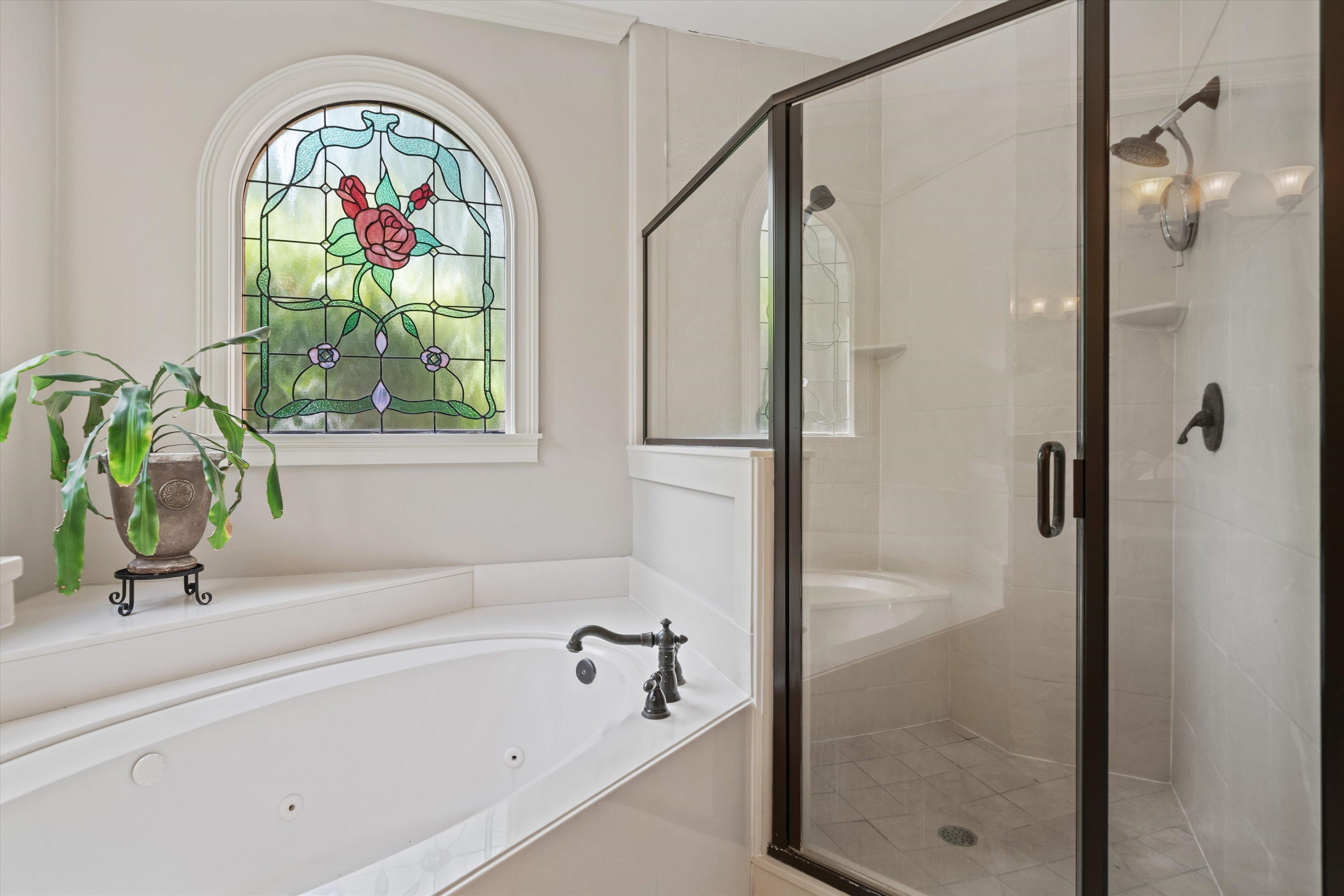 8897 Forest Ridge Cove Memphis, TN 38018 - Photo 18 of 35 Full bath with a jetted tub and a stall shower