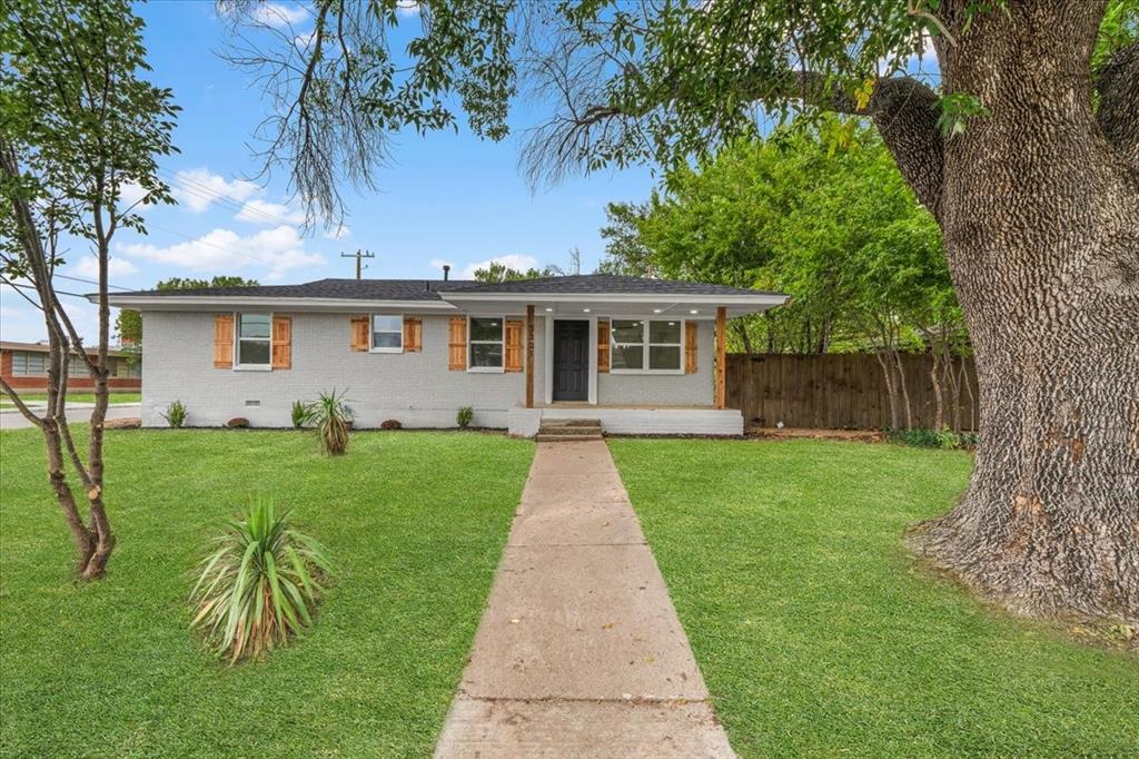 3301 Hedrick Street Fort Worth, TX 76111 - Photo 5 of 28 a front view of house with a garden