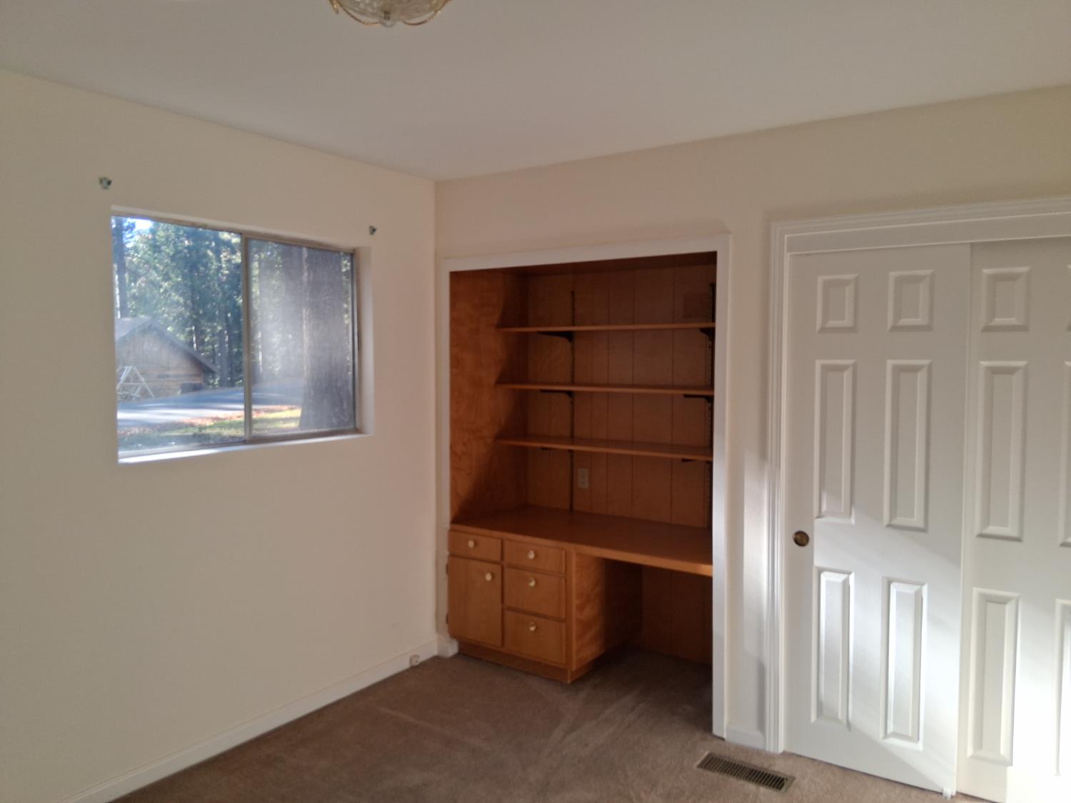 27565 Tiger Creek Road Pioneer, CA 95666 - Photo 13 of 29 a view of an empty room and entryway
