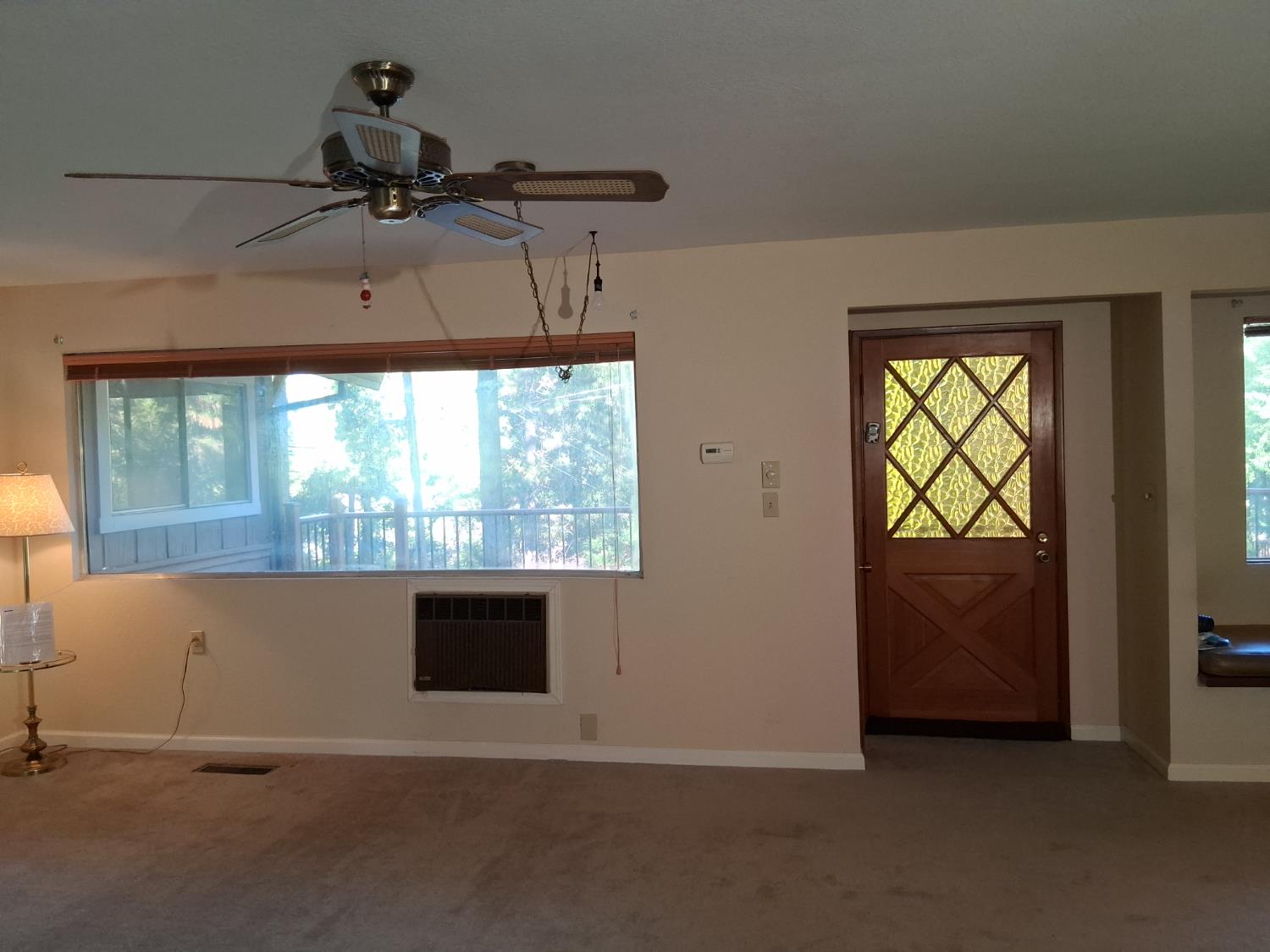 27565 Tiger Creek Road Pioneer, CA 95666 - Photo 6 of 29 an empty room with a window