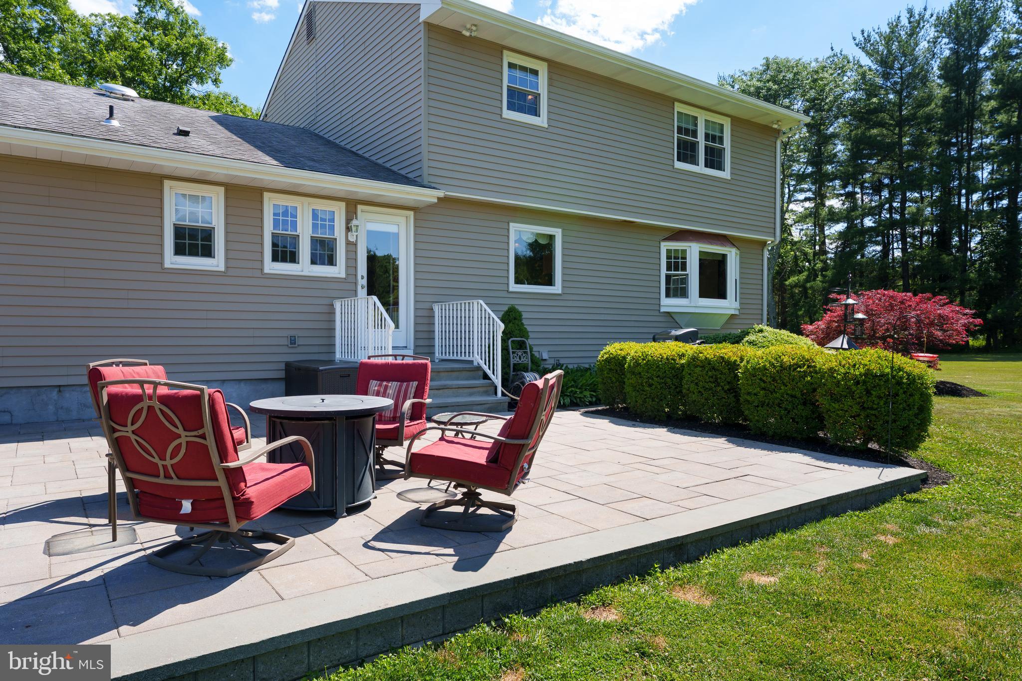 56 Valley Road Lambertville, NJ 08530 - Photo 48 of 49 a wooden bench sitting in front of a house