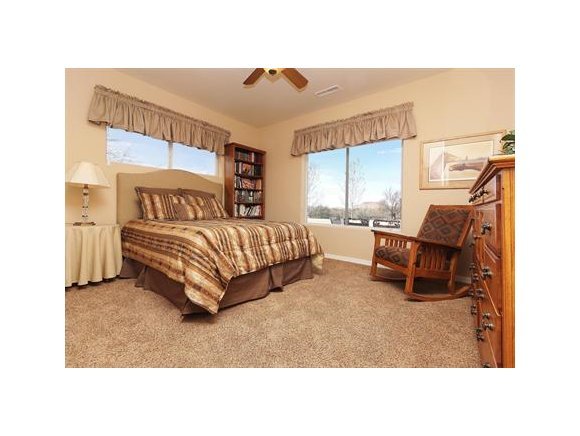 3690 Black Jack Ridge Road Prescott, AZ 86305 - Photo 13 of 23 a bedroom with a bed and window