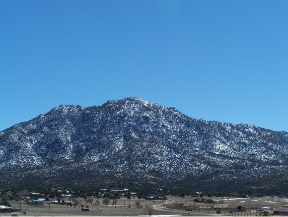 3690 Black Jack Ridge Road Prescott, AZ 86305 - Photo 23 of 23 a view of a large building with a mountain in the background