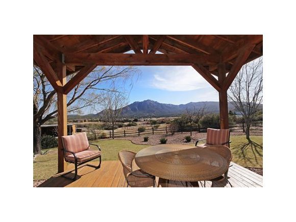 3690 Black Jack Ridge Road Prescott, AZ 86305 - Photo 3 of 23 a picture of a table and chairs in the patio
