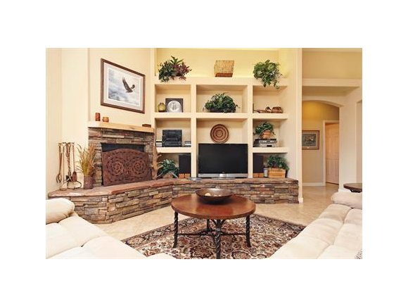 3690 Black Jack Ridge Road Prescott, AZ 86305 - Photo 5 of 23 a living room with furniture a fireplace and a flat screen tv