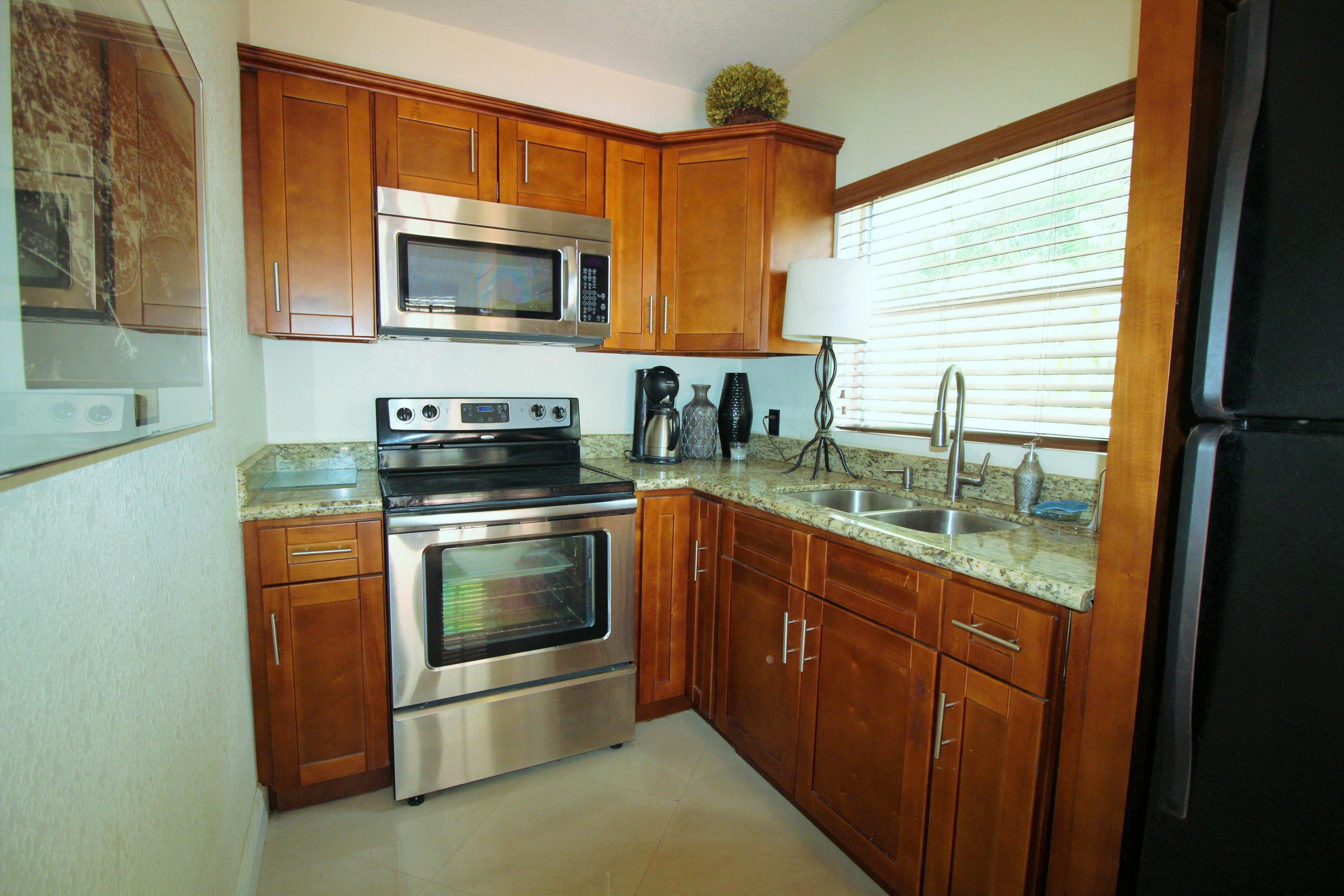 909 Andrews Road West Palm Beach, FL 33405 - Photo 23 of 33 Cottage Kitchen