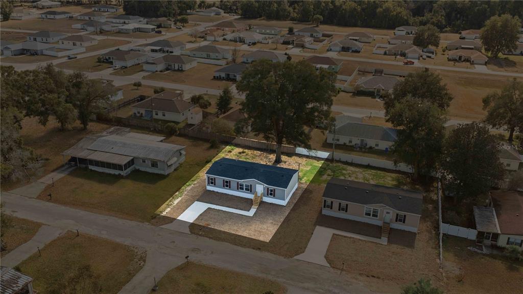 1560 Northeast 162nd Street Citra, FL 32113 - Photo 28 of 33 an aerial view of a house with a yard