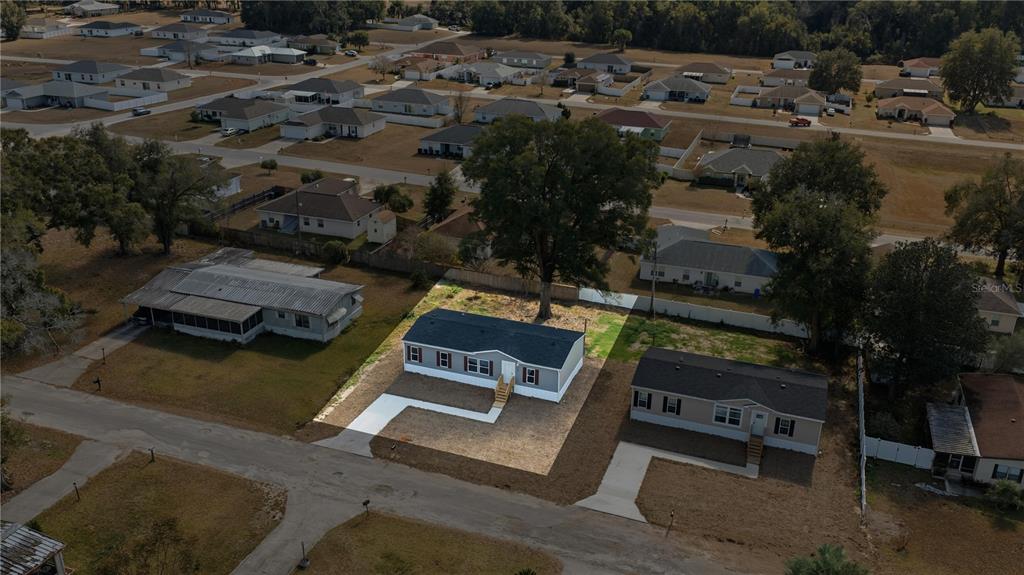 1560 Northeast 162nd Street Citra, FL 32113 - Photo 29 of 33 an aerial view of a house with a yard